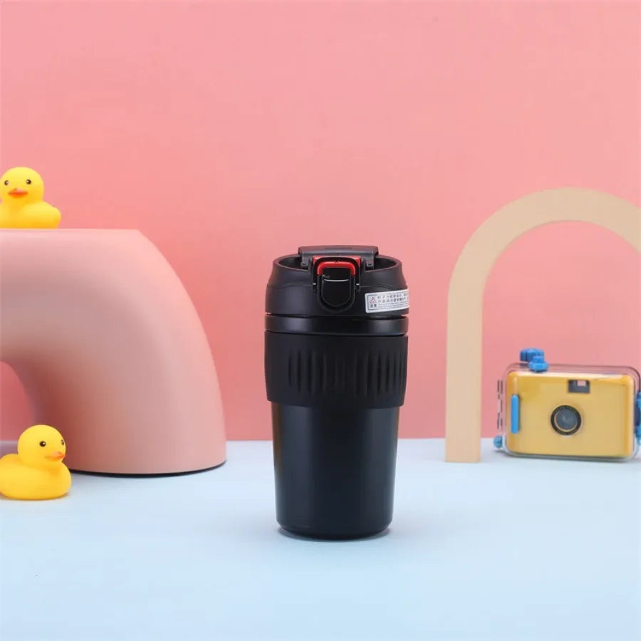 Double-wall vacuum straw insulated water bottle with portable snap-on lid for men and women, suitable for outdoor use.